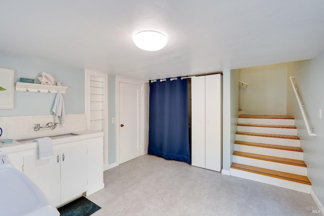 740 Valle Vista Ave, Vallejo, CA 94590 - interior space featuring white cabinets, a sink, light colored carpet, and baseboards