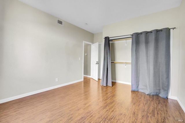 115 Barington Dr, Vallejo, CA 94591 - unfurnished bedroom with wood finished floors, a closet, and baseboards
