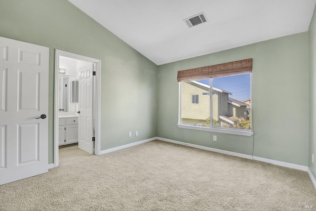 115 Barington Dr, Vallejo, CA 94591 - unfurnished bedroom with carpet flooring, lofted ceiling, baseboards, and connected bathroom