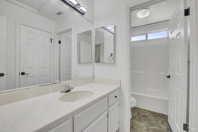 115 Barington Dr, Vallejo, CA 94591 - bathroom with toilet, vanity, stone finish flooring, and bathing tub / shower combination