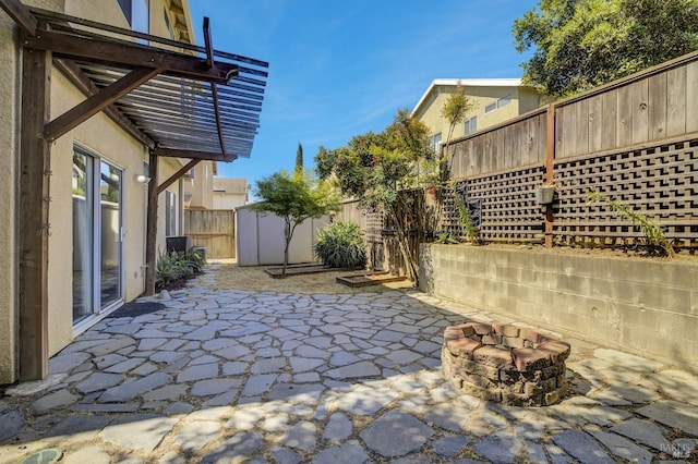 115 Barington Dr, Vallejo, CA 94591 - fenced backyard featuring an outdoor fire pit and a patio area