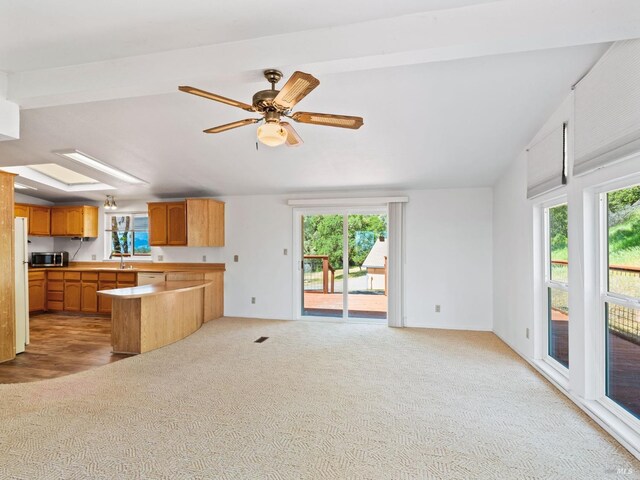 31300 Pine Mountain Rd, Cloverdale, CA 95425 - kitchen featuring open floor plan, carpet flooring, stainless steel microwave, healthy amount of natural light, and lofted ceiling