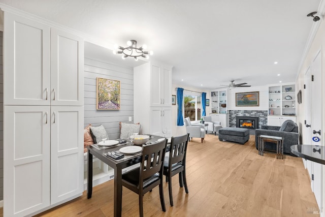 3524 Cascade St, Napa, CA 94558 - dining space featuring a ceiling fan, light wood-style flooring, a tiled fireplace, built in features, and recessed lighting