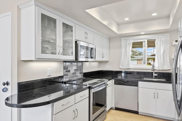 3524 Cascade St, Napa, CA 94558 - kitchen featuring stainless steel appliances, a sink, white cabinetry, a raised ceiling, and recessed lighting