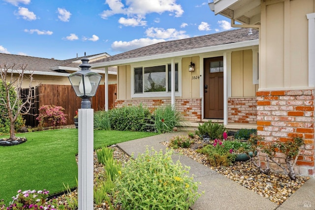 3524 Cascade St, Napa, CA 94558 - view of exterior entry featuring brick siding, roof with shingles, board and batten siding, and covered porch