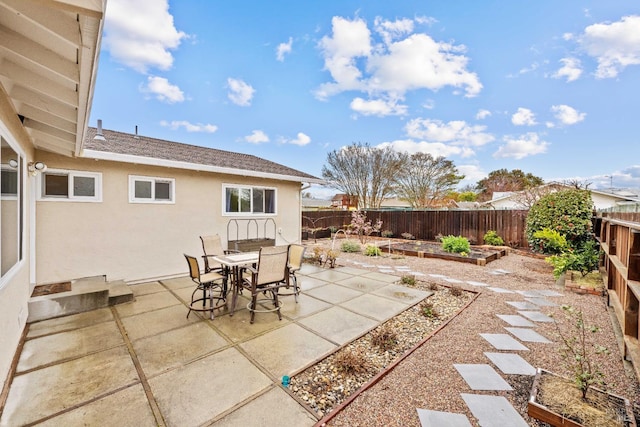 3524 Cascade St, Napa, CA 94558 - fenced backyard featuring a vegetable garden, a patio, and outdoor dining area