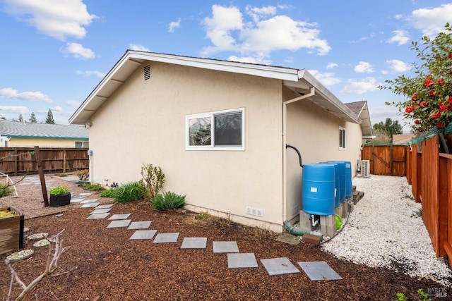 3524 Cascade St, Napa, CA 94558 - view of side of home with stucco siding and a fenced backyard
