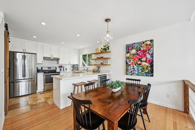 110 Morning Sun Ave, Mill Valley, CA 94941 - dining space featuring light wood-type flooring, recessed lighting, and baseboards