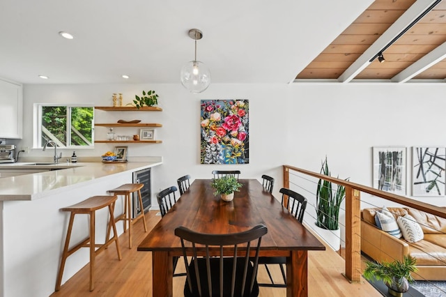 110 Morning Sun Ave, Mill Valley, CA 94941 - dining space with beverage cooler, light wood-type flooring, recessed lighting, and beam ceiling