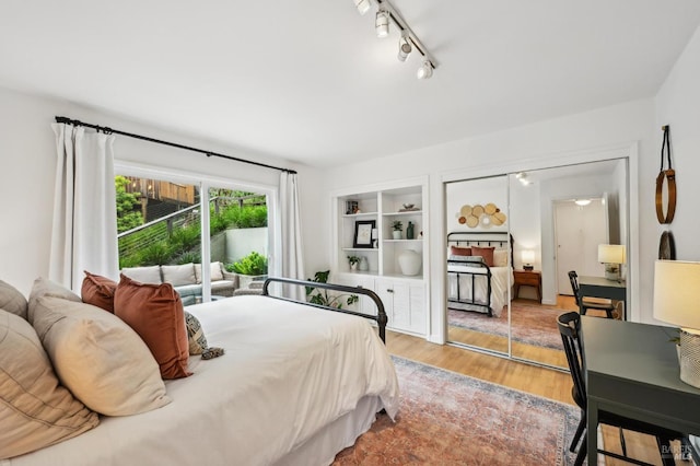 110 Morning Sun Ave, Mill Valley, CA 94941 - bedroom with light wood-style floors and track lighting