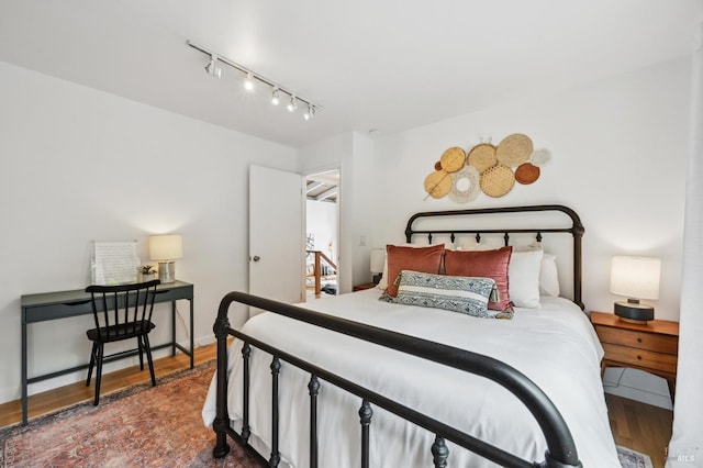 110 Morning Sun Ave, Mill Valley, CA 94941 - bedroom featuring track lighting and wood finished floors