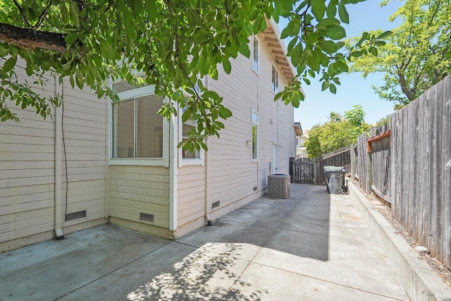 2752 Hillview Dr, Fairfield, CA 94534 - view of home's exterior featuring crawl space, a patio area, a fenced backyard, and central AC