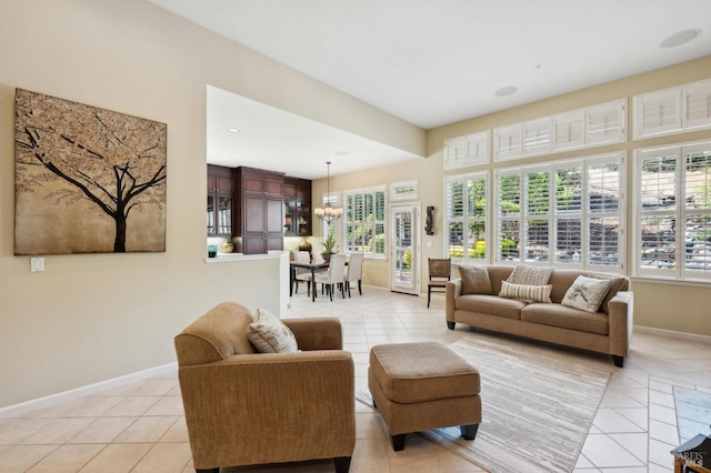 90 Oak Shade Ln, Novato, CA 94945 - living room with baseboards, light tile patterned floors, and a chandelier