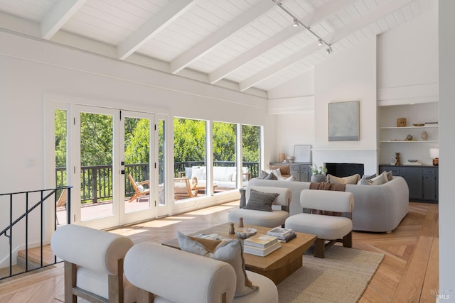 90 George Ln, Sausalito, CA 94965 - living room featuring plenty of natural light, a fireplace, high vaulted ceiling, and wooden ceiling with exposed beams