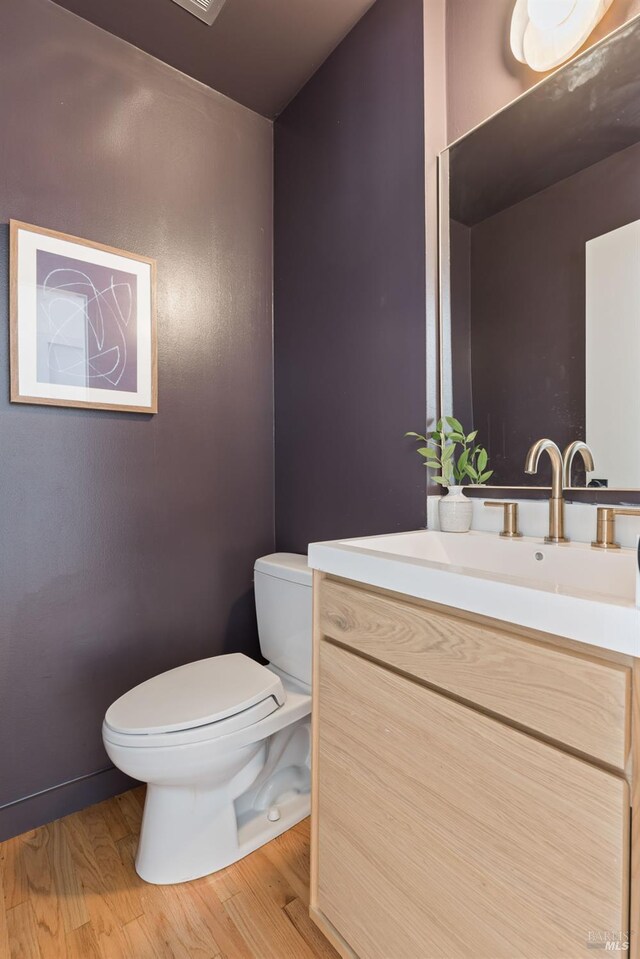 90 George Ln, Sausalito, CA 94965 - bathroom with toilet, vanity, and wood finished floors