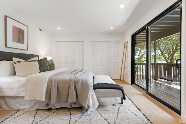 90 George Ln, Sausalito, CA 94965 - bedroom featuring access to exterior, two closets, wood finished floors, and recessed lighting