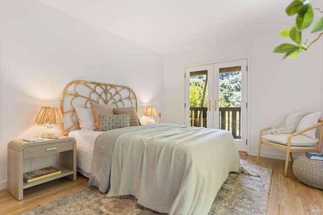 90 George Ln, Sausalito, CA 94965 - bedroom featuring access to outside, french doors, wood finished floors, and baseboards