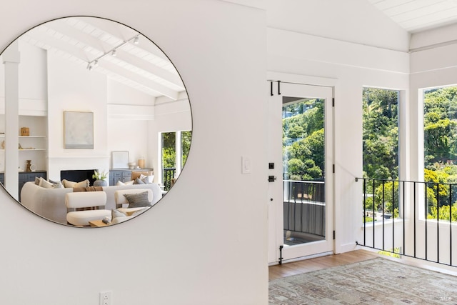 90 George Ln, Sausalito, CA 94965 - entryway featuring wood finished floors, healthy amount of natural light, high vaulted ceiling, and beam ceiling