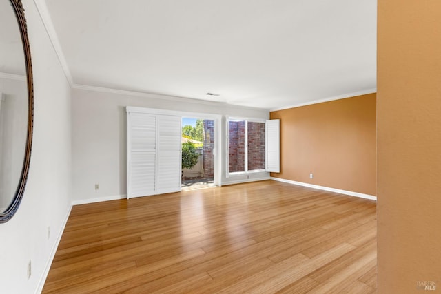 334 Twin Lakes Dr, Santa Rosa, CA 95409 - empty room featuring light wood-style floors, ornamental molding, and baseboards