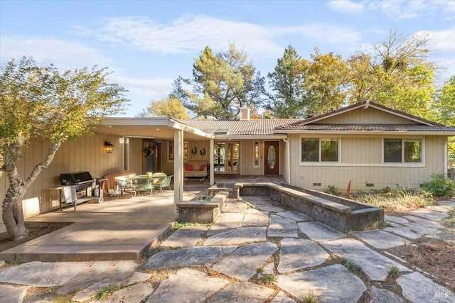 20320 Hollands Ln, Willits, CA 95490 - back of house featuring crawl space, a chimney, a patio, a tiled roof, and french doors