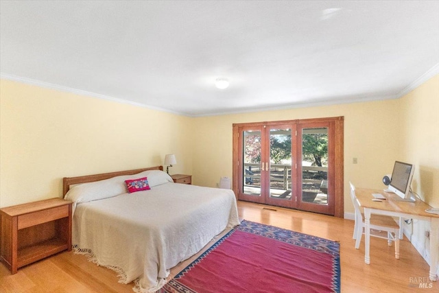 20320 Hollands Ln, Willits, CA 95490 - bedroom featuring ornamental molding, access to outside, and light wood-style flooring