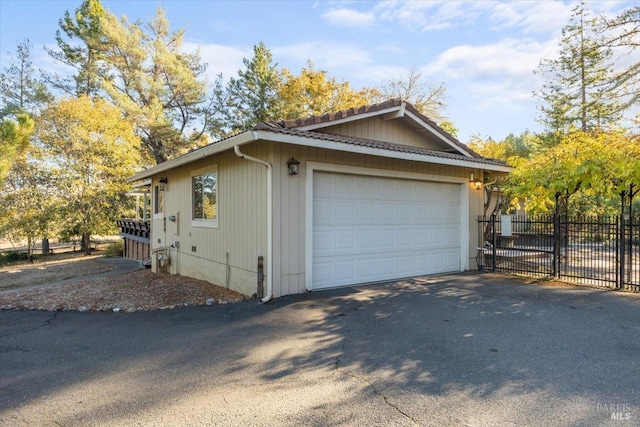 20320 Hollands Ln, Willits, CA 95490 - view of side of home featuring asphalt driveway
