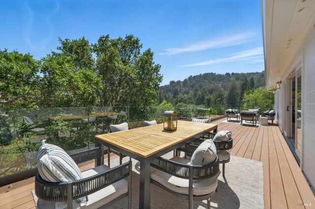 21 Sheridan Ct, Mill Valley, CA 94941 - wooden terrace featuring outdoor dining area and a forest view