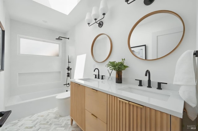 21 Sheridan Ct, Mill Valley, CA 94941 - full bath featuring bathing tub / shower combination, toilet, double vanity, and a skylight