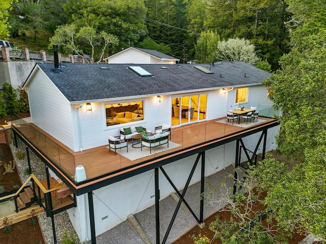 21 Sheridan Ct, Mill Valley, CA 94941 - rear view of property featuring a deck, outdoor lounge area, roof with shingles, and outdoor dining space