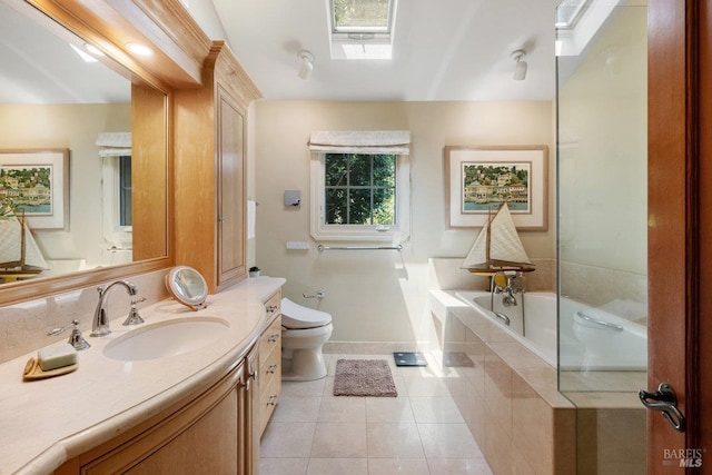 3227 State Highway 128, Calistoga, CA 94515 - bathroom with vanity, tile patterned floors, toilet, a relaxing tiled tub, and baseboards