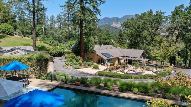 3227 State Highway 128, Calistoga, CA 94515 - outdoor pool with a pergola, a patio, and a mountain view