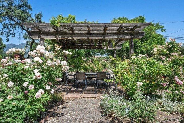 3227 State Highway 128, Calistoga, CA 94515 - view of patio featuring a pergola and outdoor dining area