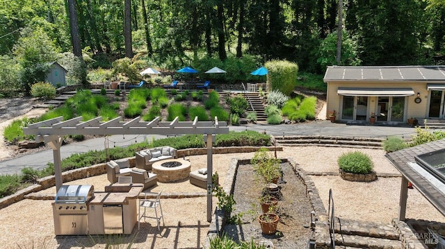 3227 State Highway 128, Calistoga, CA 94515 - view of yard featuring a fire pit, a patio, and an outbuilding