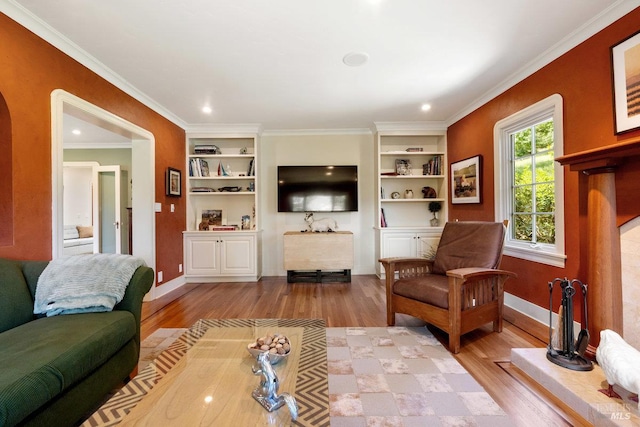 3227 State Highway 128, Calistoga, CA 94515 - living room featuring light wood-style flooring, baseboards, built in shelves, and crown molding