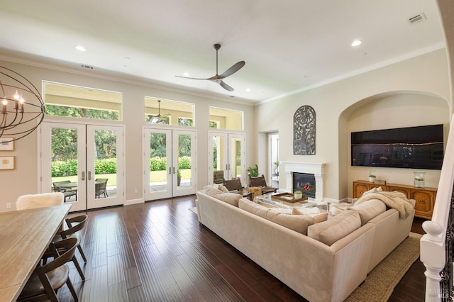 907 Serendipity Way, Napa, CA 94558 - living room with french doors, ornamental molding, ceiling fan, a glass covered fireplace, and dark wood finished floors
