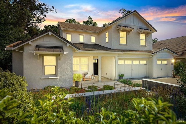 907 Serendipity Way, Napa, CA 94558 - view of front of property with concrete driveway, stucco siding, a garage, and board and batten siding