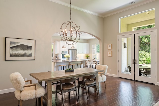 907 Serendipity Way, Napa, CA 94558 - dining area featuring arched walkways, plenty of natural light, crown molding, and dark wood finished floors