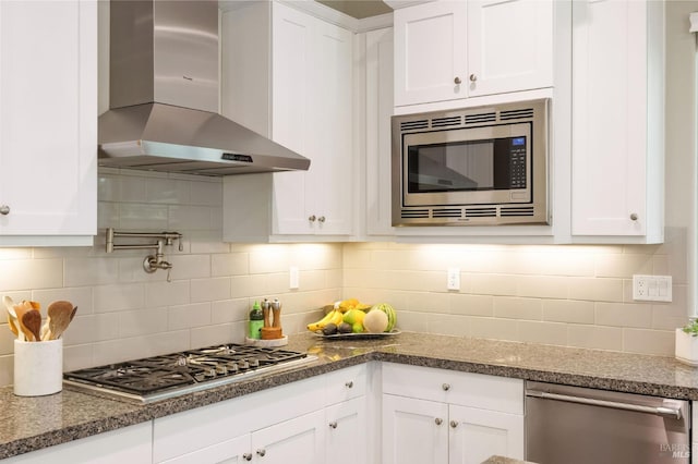 907 Serendipity Way, Napa, CA 94558 - kitchen with wall chimney exhaust hood, stainless steel appliances, white cabinets, tasteful backsplash, and stone countertops
