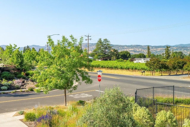 907 Serendipity Way, Napa, CA 94558 - view of asphalt road featuring a mountain view, street lights, and traffic signs