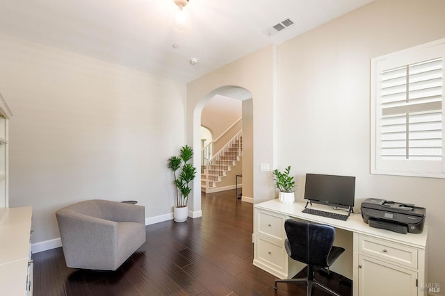 907 Serendipity Way, Napa, CA 94558 - home office featuring arched walkways, dark wood-type flooring, and built in desk