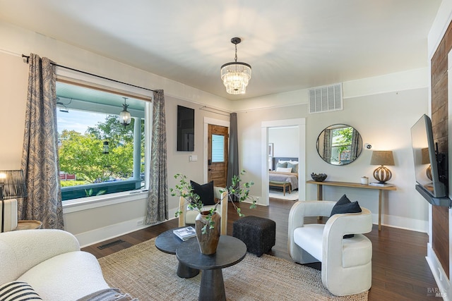 660 S Main St, Sebastopol, CA 95472 - living area featuring a chandelier, wood finished floors, and baseboards