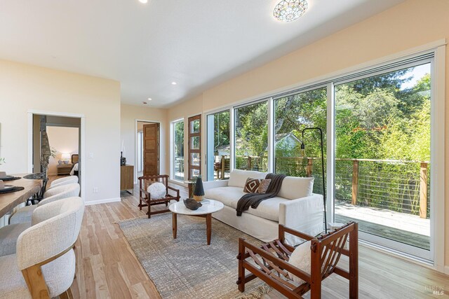 660 S Main St, Sebastopol, CA 95472 - living area featuring dark wood-style floors, a chandelier, and baseboards