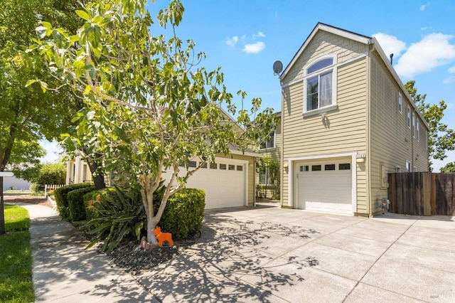 1142 Kellogg St, Suisun City, CA 94585 - view of home's exterior with concrete driveway and a garage