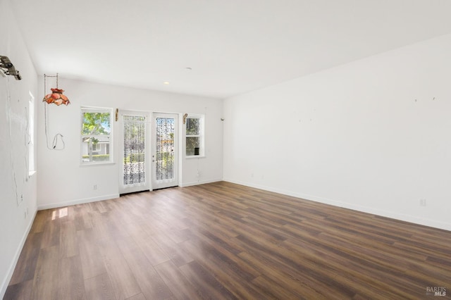 1142 Kellogg St, Suisun City, CA 94585 - unfurnished room featuring baseboards, wood finished floors, and recessed lighting
