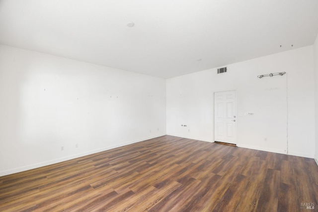 1142 Kellogg St, Suisun City, CA 94585 - unfurnished room with dark wood-style floors and baseboards