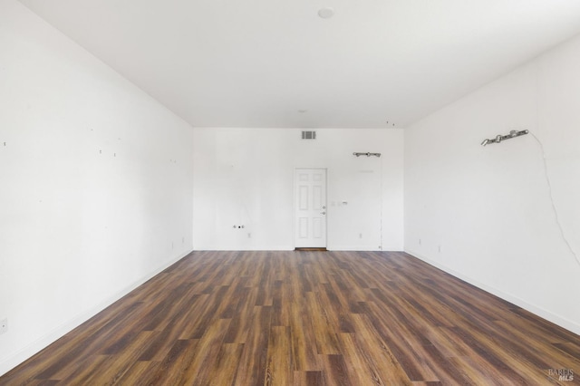 1142 Kellogg St, Suisun City, CA 94585 - empty room featuring dark wood-style flooring and baseboards