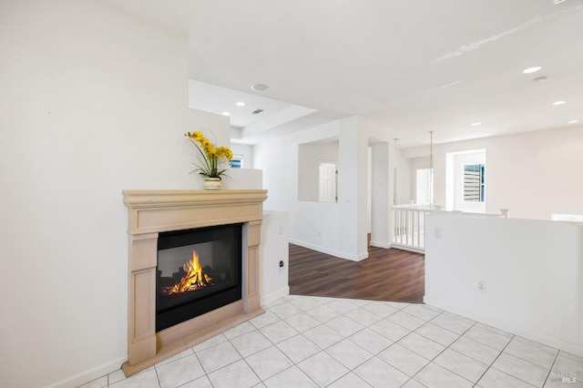 1142 Kellogg St, Suisun City, CA 94585 - living room with light wood-style floors, recessed lighting, a glass covered fireplace, and baseboards