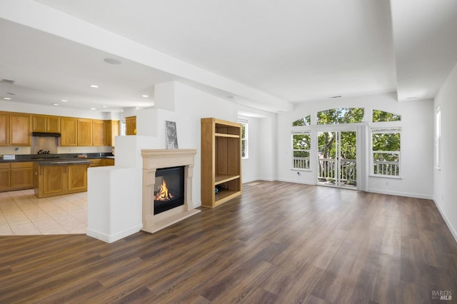 1142 Kellogg St, Suisun City, CA 94585 - unfurnished living room with plenty of natural light, recessed lighting, wood finished floors, and baseboards
