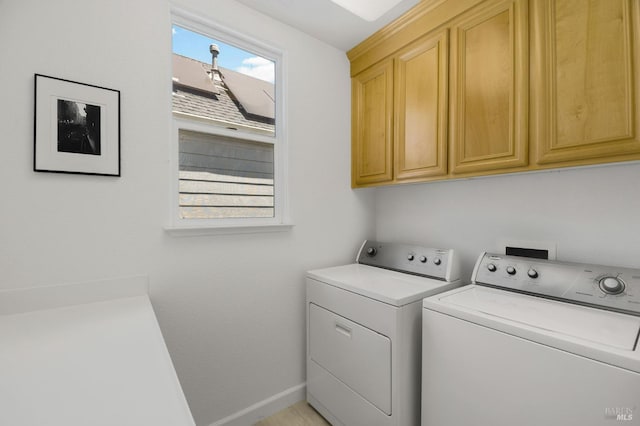 1142 Kellogg St, Suisun City, CA 94585 - laundry room with washing machine and clothes dryer, cabinet space, and baseboards
