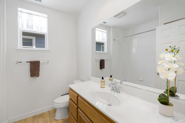 1142 Kellogg St, Suisun City, CA 94585 - bathroom featuring toilet, vanity, a shower, and baseboards